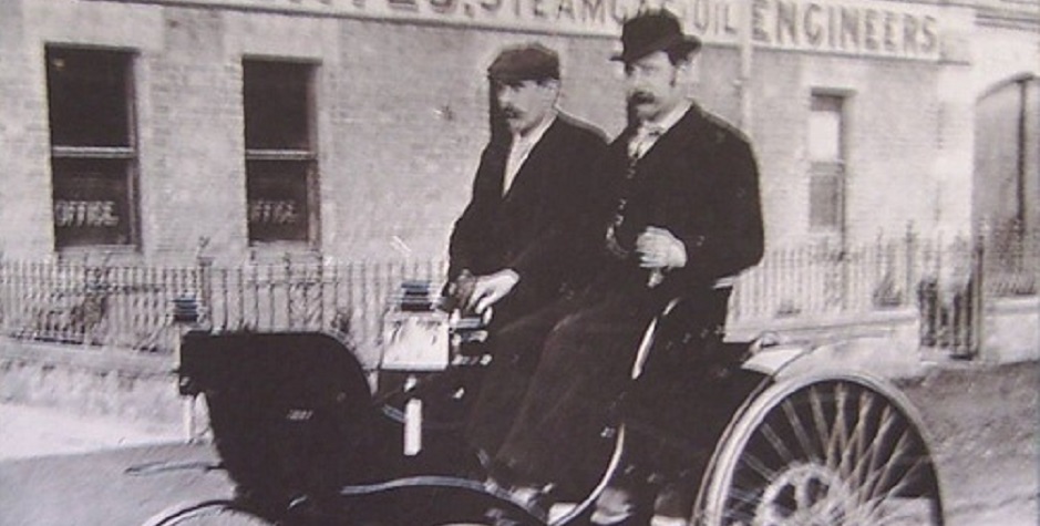 Image of Walter Payne and George Bates circa 1898 driving past what would become the Radenite factory on Foleshill Road in Coventry