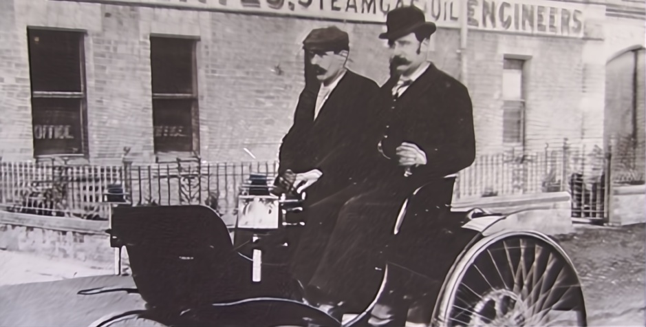 Image of Walter Payne and George Bates circa 1898 driving past what would become the Radenite factory on Foleshill Road in Coventry